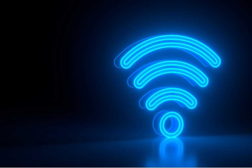 futuristic glowing blue wi fi symbol on black dark background with blurred reflection signal.jpgs10